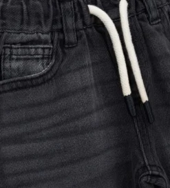 Jeans con laccio