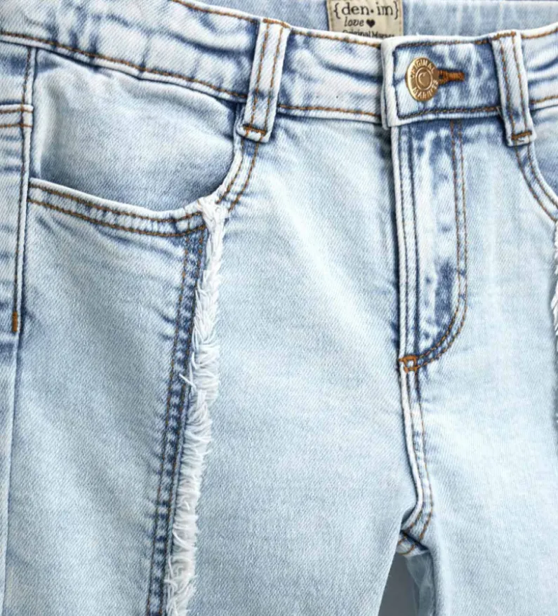 Jeans flare sfrangiati